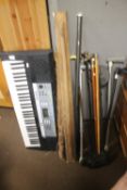 A QUANTITY OF ASSORTED WALKING STICKS ETC AND A KEYBOARD