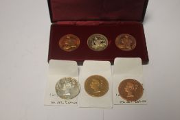 A QUEEN VICTORIA RETRO PATTERN CROWN SET, 1879, ONE IN SILVER AND TWO IN COPPER, together with an