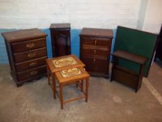 FOUR ITEMS TO INCLUDE TWO CHESTS OF DRAWERS, TEAK NEST OF TABLES, A MAGAZINE TABLE / RACK,