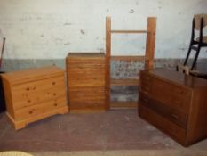 THREE CHESTS OF DRAWERS AND A PINE STORAGE SHELF