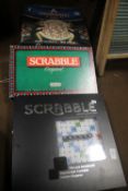 A COLLECTION OF GAMES TO INCLUDE SCRABBLE DE-LUXE