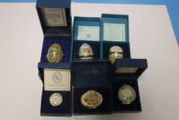 A COLLECTION OF THREE HALCYON DAYS EGGS AND THREE HALCYON DAYS PIN DISHES ALL BOXED