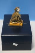 A BOXED HALCYON DAYS SQUIRREL MONKEY