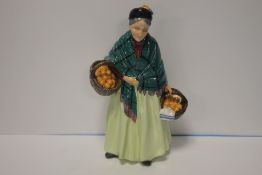 A ROYAL DOULTON FIGURINE 