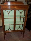AN ANTIQUE EDWARDIAN INLAID DISPLAY CABINET