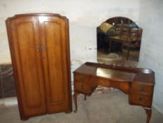 A VINTAGE WALNUT WARDROBE AND DRESSING TABLE