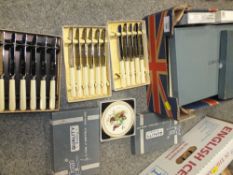 A SMALL TRAY OF FLATWARE AND, COASTERS AND PLACE MATS