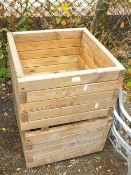 A PAIR OF SQUARE WOODEN PLANTERS