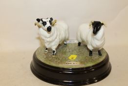 A BESWICK RAM AND SHEEP ON PLINTH ENTITLED 'EWE & I'