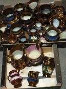 A LARGE TRAY TOGETHER WITH A SMALL TRAY OF COPPER LUSTRE WARE JUGS ETC.