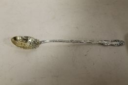 A LONG STERLING SILVER PIERCED SPOON LENGTH - 21CM