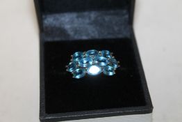 A HALLMARKED 9 CT GOLD BLUE STONE DRESS RING, APPROX WEIGHT 3.4 G