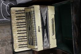 A VINTAGE 'RIOS' ACCORDION WITH CASE