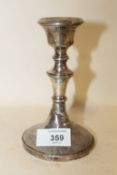 A HALLMARKED SILVER CANDLE STICK, SPLIT AND TWISTED AT THE BASE