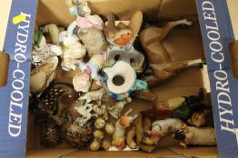 A TRAY OF SMALL CERAMIC FIGURES TO INCLUDE WADE, BESWICK ETC.