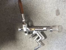 A BOJ BAR MOUNTED CORK REMOVER