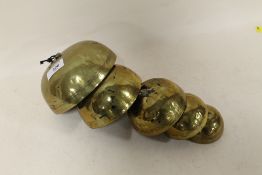 A SET OF POLISHED BRONZE ORIENTAL TEMPLE / MEDITATION BELLS