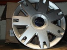 TWO SETS OF FOUR TRANSIT WHEEL TRIMS