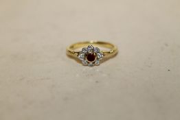 A HALLMARKED 18 CT GOLD RUBY AND DIAMOND RING, APPROX WEIGHT 2.9 G