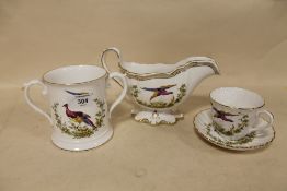 A HAND PAINTED SPODE LOVING CUP, A MATCHING SAUCE BOAT AND CUP AND SAUCER (3)