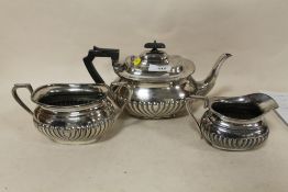 A SILVER PLATED THREE PIECE TEA SERVICE