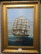 A GILT FRAMED OIL ON BOARD DEPICTING SAILING VESSELS ENTITLED 'AT LEITH' SIGNED 'J CUNNINGHAM' 46