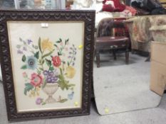 A VINTAGE NEEDLEPOINT 43 X 60 CM IN A HEAVILY CARVED OAK FRAME TOGETHER WITH AS SHAPED MIRROR (2)