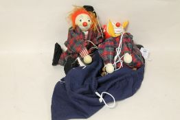 TWO WOODEN CLOWN PUPPETS