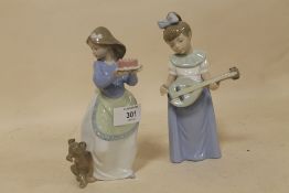 TWO SMALL NEO FIGURES