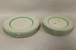 ELEVEN NEWPORT POTTERY CLARICE CLIFF PLATES, CONSISTING OF 5 DINNER PLATES AND SIX SIDE PLATES