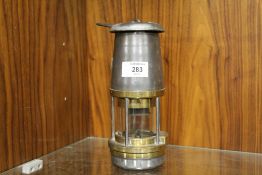 A VINTAGE 'WOLF SAFETY' MINERS LAMP