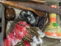 A BOX OF TRIBAL COLLECTABLES TO INCLUDE BOOMERANGS, NATIVE AMERICAN HEADDRESS, BONGO DRUM ETC.