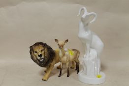 A ROYAL DOULTON IMAGES CAPRICORN GOAT FIGURE TOGETHER WITH A BESWICK LION AND A BESWICK DEER
