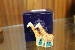 A BOXED ROYAL CROWN DERBY PAIR OF MINIATURE GIRAFFES