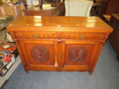 AN EDWARDIAN MAHOGANY CARVED SIDEBOARD WITH TWO DRAWERS H-89 W-116 CM