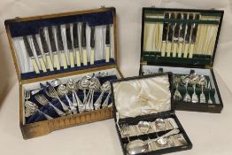 TWO PART CASED CANTEENS OF CUTLERY TOGETHER WITH A CASED SET OF SPOONS AND FORKS (3)