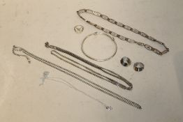 A BAG F STERLING SILVER JEWELLERY TO INCLUDE A BANGLE, CHAINS ETC.