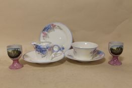 A SHELLEY CREAM JUG, SUGAR BOWL AND THREE SAUCERS, TOGETHER WITH A PAIR OF EGG CUPS