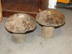 TWO SMALL STONE MUSHROOMS