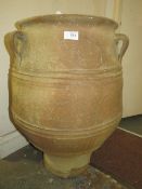 A CRETAN POTTERY AMPHORA / URN WITH INCISED DETAIL H 66 CM
