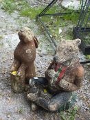 TWO STONE GARDEN ORNAMENTS DEPICTING A RABBIT AND BADGER