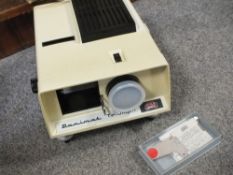 A BOXED PAXIMAT TRIUMPH PROJECTOR BY BRAUN OF NEURENBURG