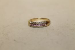 A HALLMARKED 9 CT GOLD PINK SAPPHIRE DRESS RING, APPROX WEIGHT 2.5 G