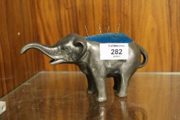 A VINTAGE ELEPHANT PIN CUSHION
