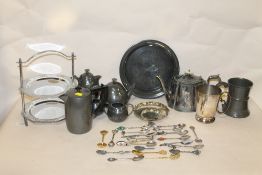 A SMALL TRAY OF HAMMERED PEWTER WARE ETC., COLLECTION OF SOUVENIR SPOONS AND TWO FLAT IRONS