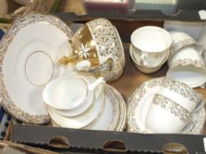 A TRAY OF DIAMOND CHINA CUPS AND SAUCERS, TOGETHER WITH A MATCHED GIBSON TEAPOT