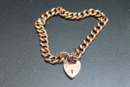 A HALLMARKED 9 CARAT ROSE GOLD CURB LINK BRACELET, approx weight 13.5g