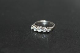 A FIVE STONE DIAMOND SET PLATINUM RING, approx weight 3.5g, ring size L