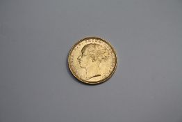 A VICTORIAN 1884 GOLD SOVEREIGN