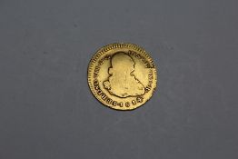 A COLONIAL SPANISH ONE ESCUDO GOLD COIN 1814, named Ferdinand VII, approx weight 3.2g
